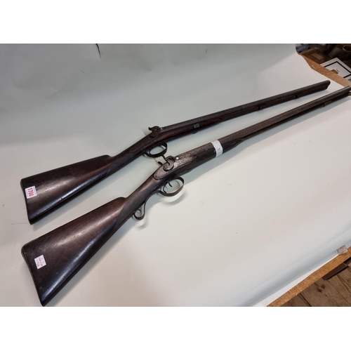 1708 - Two 12 bore double barrel percussion shotguns, (both in poor condition).