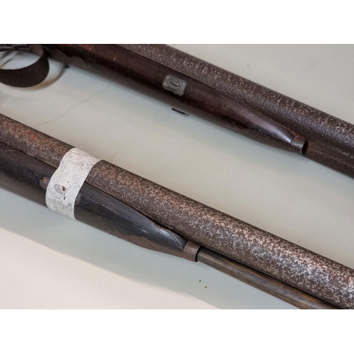 1708 - Two 12 bore double barrel percussion shotguns, (both in poor condition).