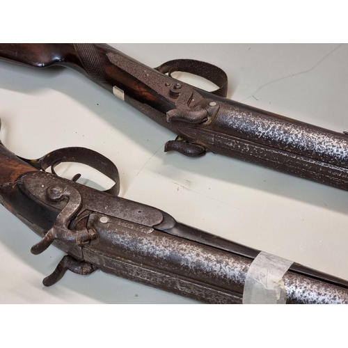 1708 - Two 12 bore double barrel percussion shotguns, (both in poor condition).