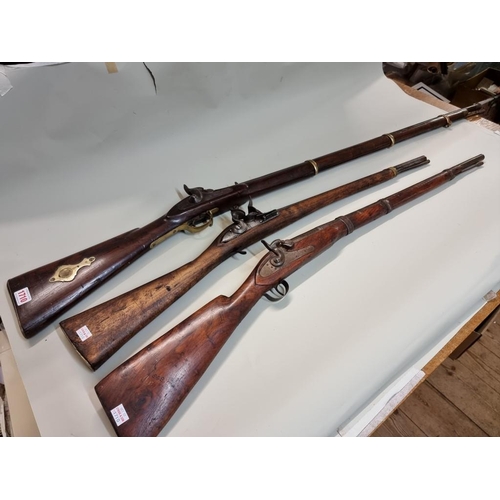 1710 - Three Indian muzzle loading rifles.