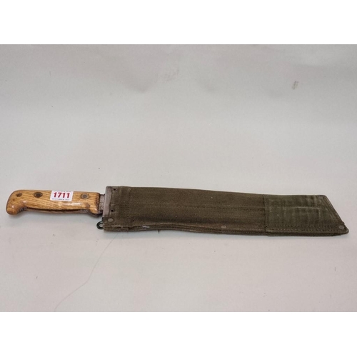 1711 - A Martindale Golok No.2 British Army machete and green canvas sheath, the blade 33.5c... 