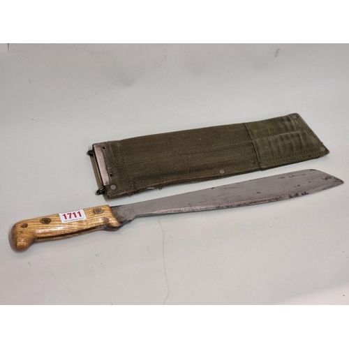 1711 - A Martindale Golok No.2 British Army machete and green canvas sheath, the blade 33.5c... 