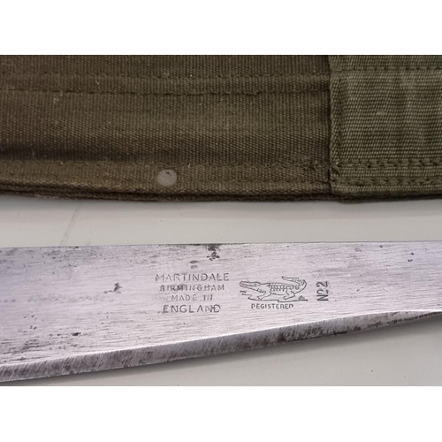 1711 - A Martindale Golok No.2 British Army machete and green canvas sheath, the blade 33.5c... 