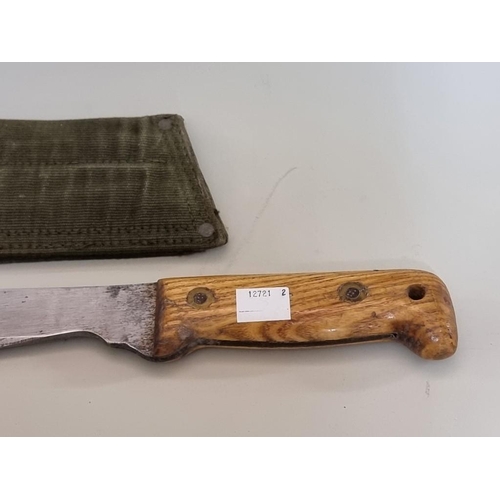 1711 - A Martindale Golok No.2 British Army machete and green canvas sheath, the blade 33.5c... 