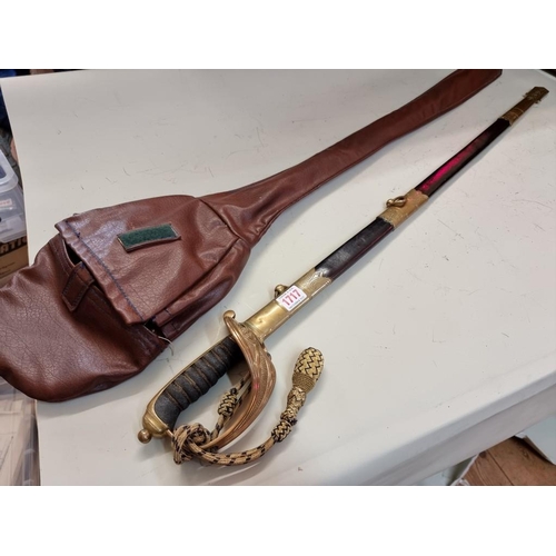 1717 - An 1827 pattern Royal Navy officer's sword and scabbard, in leatherette bag.