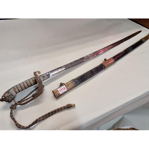 1718 - WITHDRAWN FROM SALE An 1827 pattern Royal Navy officer's sword and scabbard.