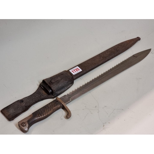 1725 - An Imperial German World War I sawback butcher bayonet and steel scabbard, the blade stamped 'Waffen... 