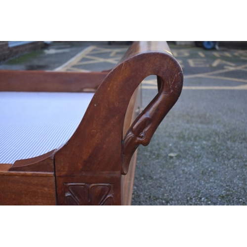 1040A - A Continental mahogany sleigh bed, with swan's head decoration, 245cm long x 150cm wide.... 