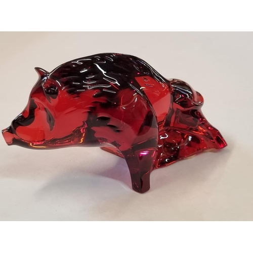 1244 - A Baccarat ruby glass 'Sanglier' or Boar, 6cm high.