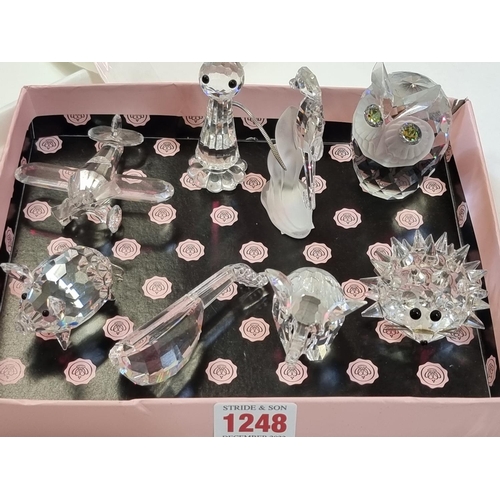 1248 - Eight Swarovski models, to include a seahorse, 8cm high, and an owl. 