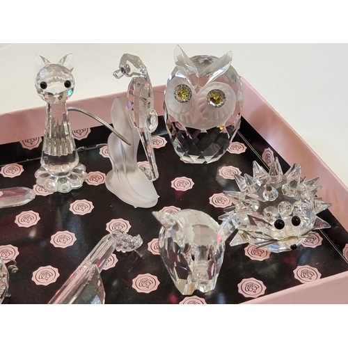 1248 - Eight Swarovski models, to include a seahorse, 8cm high, and an owl. 