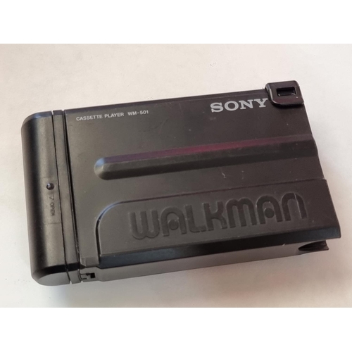 1249 - A Sony Walkman WM-501, (glued repair to battery flap), with carrying case. ... 