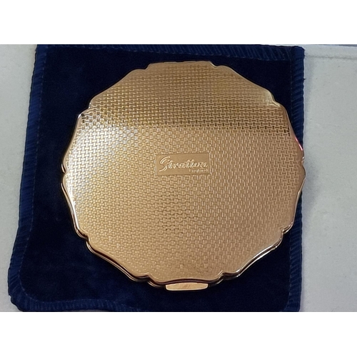 1254 - A Stratton 'Orient Express' compact mirror, with suede pouch and box. 