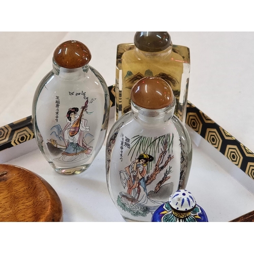 1257 - A mixed lot of works of art, to include Chinese internally painted snuff bottles. (10) ... 