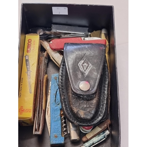 1261 - A collection of old penknives; together with a folding pocket comb, boxed.