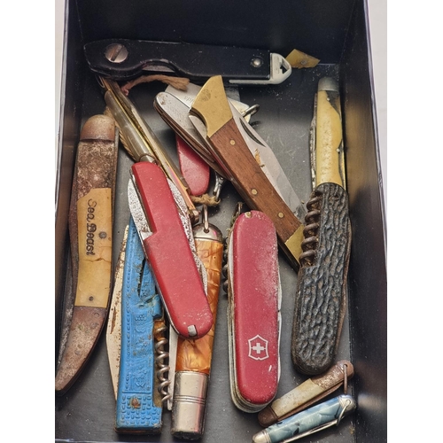 1261 - A collection of old penknives; together with a folding pocket comb, boxed.