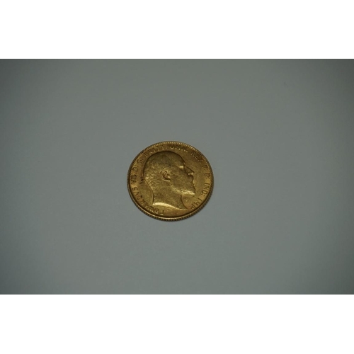 400A - Coins: a George V 1910 gold sovereign.