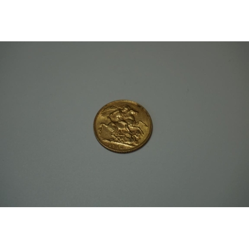 400A - Coins: a George V 1910 gold sovereign.