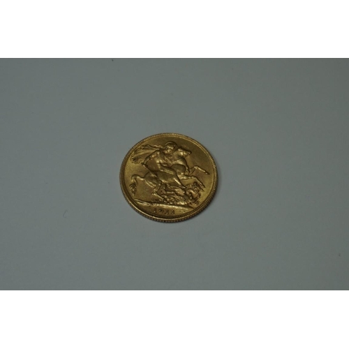 403 - Coins: a George V 1911 gold sovereign.