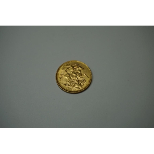 405 - Coins: an Edward VII 1902 gold sovereign.