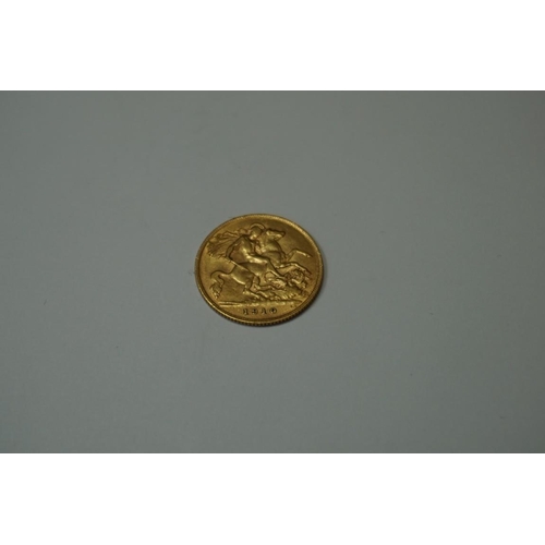 410 - Coins: an Edward VII 1910 gold half sovereign.