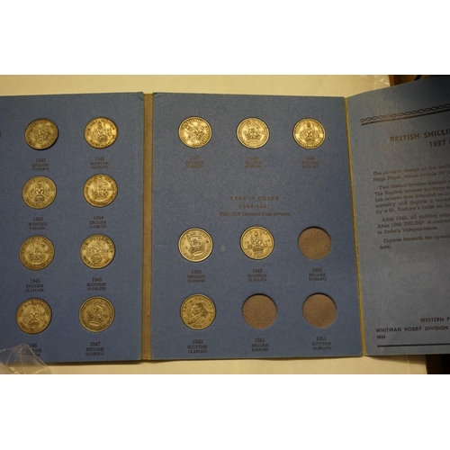 465 - Coins: a US 1922 silver peace dollar, in a pendant mount; together with an album of shillings 1937-5... 