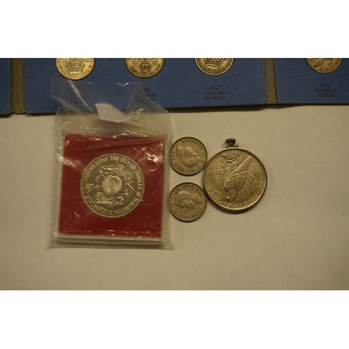 465 - Coins: a US 1922 silver peace dollar, in a pendant mount; together with an album of shillings 1937-5... 