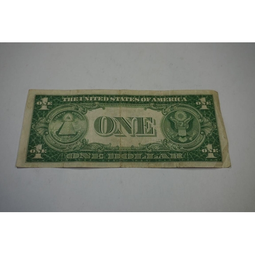 471 - Banknotes: a US $1 note, signed by David Rockefeller Sr and others, dated 18-3-44.