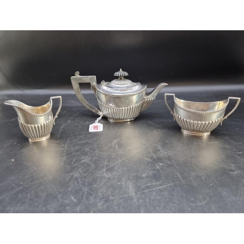 507 - A Victorian silver three piece bachelor's tea set, by James Deakin & Sons, Sheffield 1898, gross... 