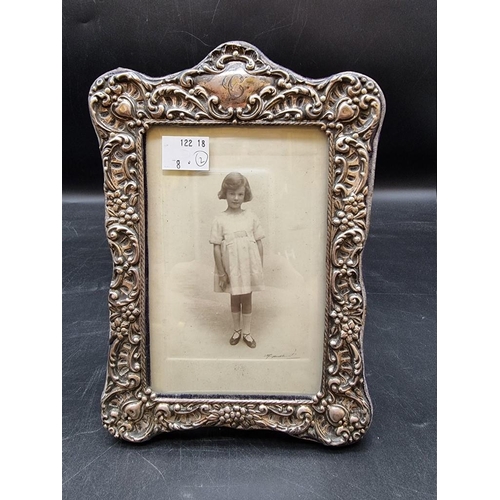 512 - A large modern rectangular photograph frame, 30 x 25cm; together with another smaller example. (2)... 