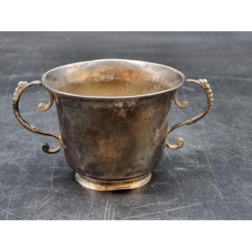 520 - A George III silver twin handled cup, by James Stamp, London 1779, 6cm high, 93g,... 