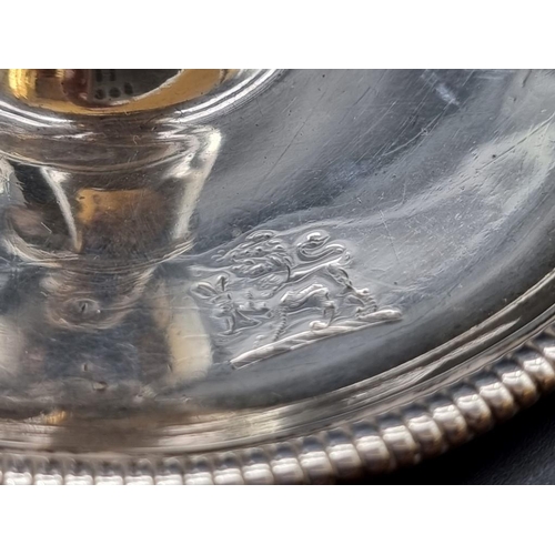 521 - A William IV silver chamber stick, 324g, (repaired).