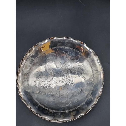 535 - A Chinese white metal swing handle bowl, stamped 'Tackhing 90% Silver', 21cm diameter.328g... 