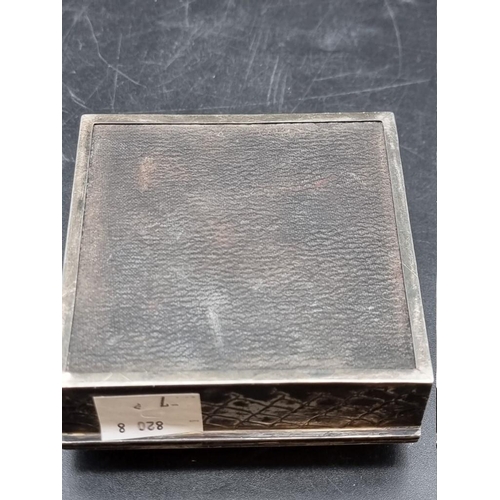 540 - An Edwardian silver cigarette box, having crocodile skin style chased decoration, by S Blanckensee &... 