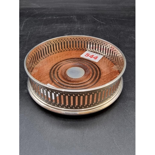 544 - A silver bottle coaster, by Harrison Brothers & Howson Ltd, London 1994, 12.5cm diameter.... 