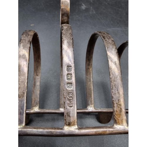 545 - A pair of silver toast racks, by E J Houlston, Birmingham 1946, 10.5cm, 161g. (2)... 