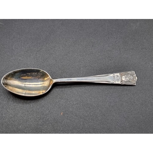 549 - A cased set of six silver George V commemorative teaspoons; together with a cased set of six silver ... 