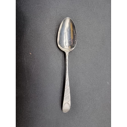 550 - A set of six George III bright cut silver teaspoons, by George Gray, London 1784, 65g, in associated... 