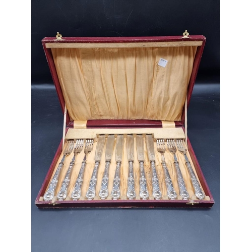 552 - A cased set of six silver handled fish knives and forks, by C H Beatson, Sheffield 1929.... 