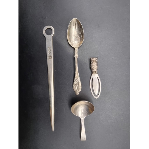 568 - A small quantity of silver cutlery; together with a silver letter opener and a silver Owl bookmark, ... 