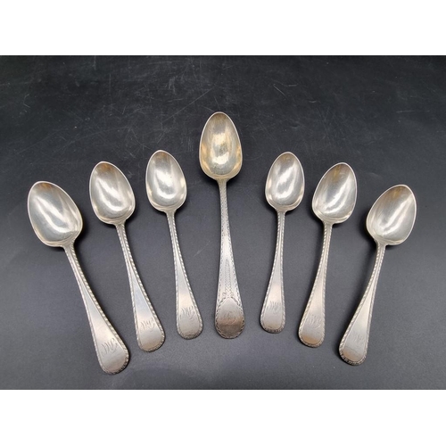 577 - A set of six Victorian silver bright cut Old English pattern dessert spoons, by H J Lias & ... 