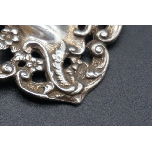 596 - A late Victorian pierced silver nurse's buckle, by W & Co, Birmingham 1901, 11cm, 60g,... 