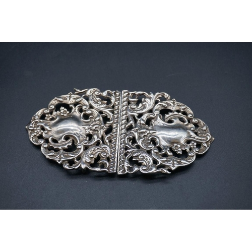 596 - A late Victorian pierced silver nurse's buckle, by W & Co, Birmingham 1901, 11cm, 60g,... 