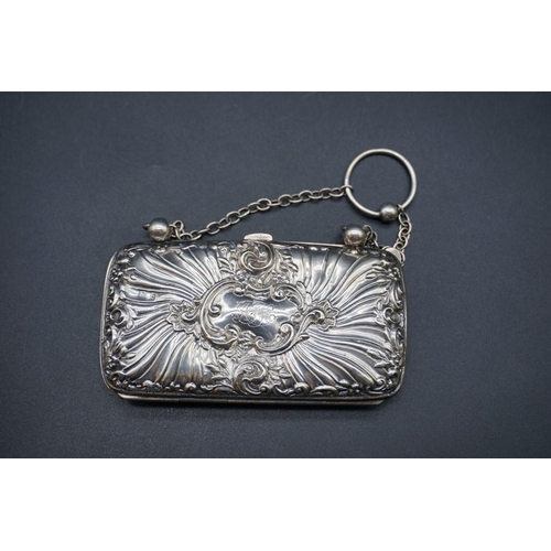 603 - An Edwardian silver purse, by William J Holmes, Birmingham 1906, 9.5cm.