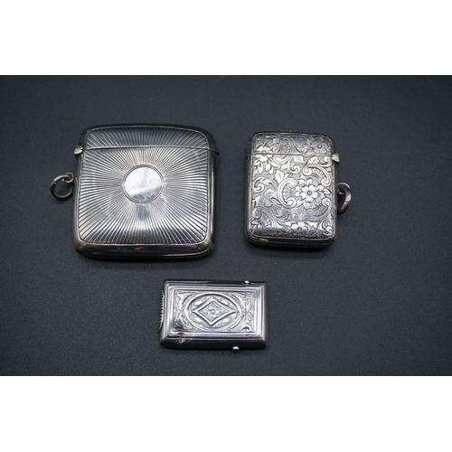 604 - Three silver vesta cases, one by Cohen & Charles, Birmingham 1907, 5.5cm, 81g. (3)... 