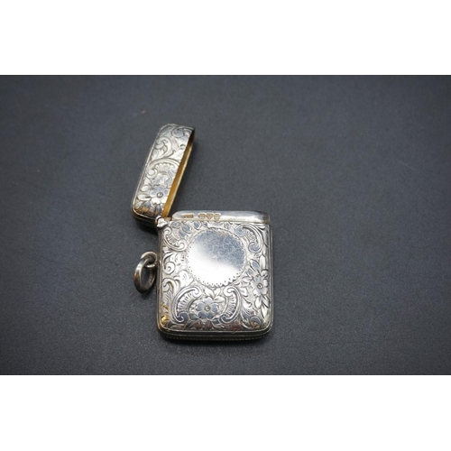 604 - Three silver vesta cases, one by Cohen & Charles, Birmingham 1907, 5.5cm, 81g. (3)... 