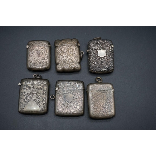 605 - Six various silver vesta cases, 142g.