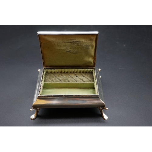 607 - A silver jewellery casket, 11cm; together with a silver vesta case. (2)