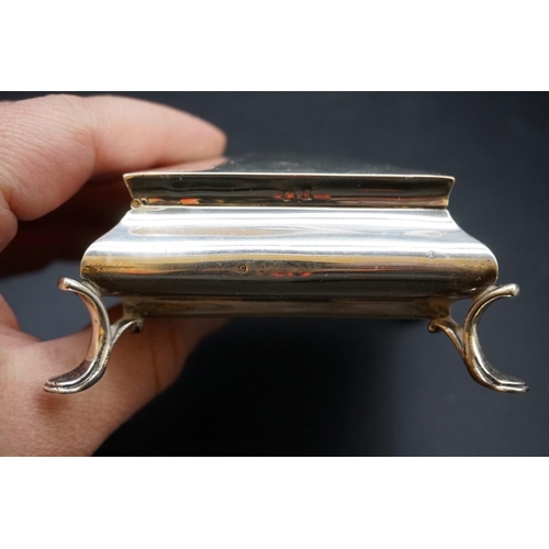 607 - A silver jewellery casket, 11cm; together with a silver vesta case. (2)