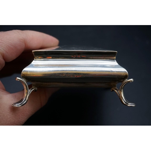 607 - A silver jewellery casket, 11cm; together with a silver vesta case. (2)